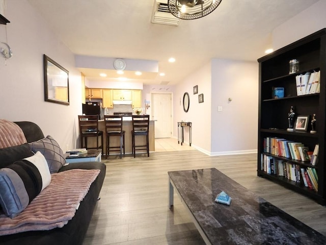 234 Water St Unit 101, Wakefield, MA 01880 - living room with light wood-style floors, recessed lighting, and a ceiling fan