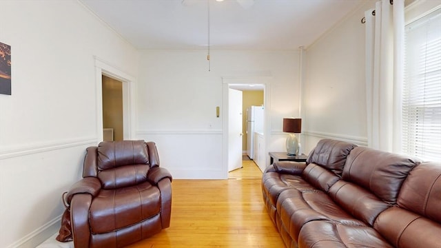 30 Hartshorn Ave, Worcester, MA 01602 - living room featuring ornamental molding, light wood-type flooring, plenty of natural light, and ceiling fan