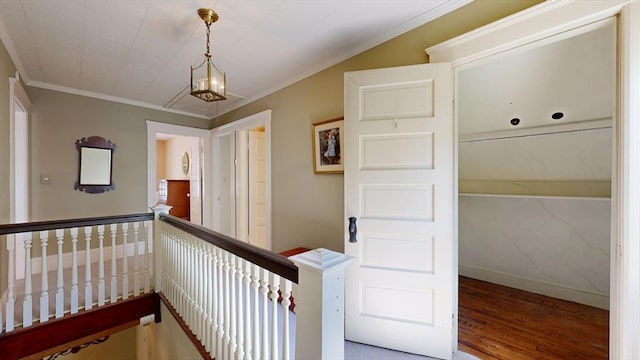 30 Hartshorn Ave, Worcester, MA 01602 - hallway with an upstairs landing, wood finished floors, crown molding, and baseboards