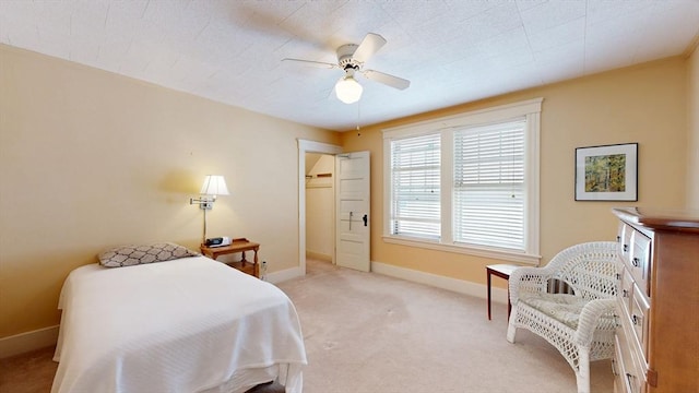 30 Hartshorn Ave, Worcester, MA 01602 - bedroom with light carpet, baseboards, a ceiling fan, a spacious closet, and a closet