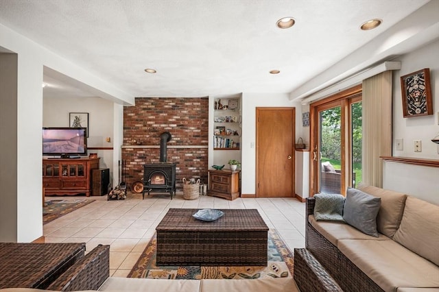 tiled living area with a wood stove and built in features
