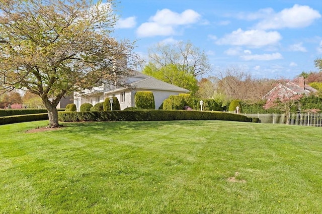 view of yard with fence