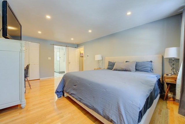 bedroom featuring light hardwood / wood-style floors