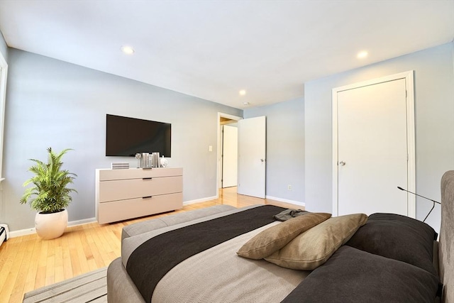 bedroom featuring light hardwood / wood-style floors