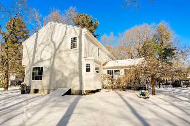 view of snow covered property