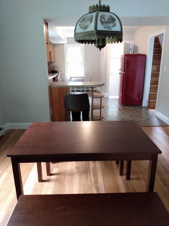 unfurnished dining area featuring light hardwood / wood-style floors