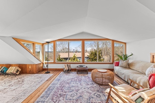 10 Quissett, Falmouth, MA 02543 - living room with plenty of natural light, lofted ceiling, and hardwood / wood-style flooring