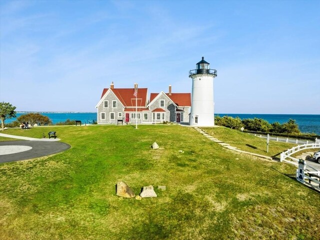 10 Quissett, Falmouth, MA 02543 - back of house featuring a water view and a lawn
