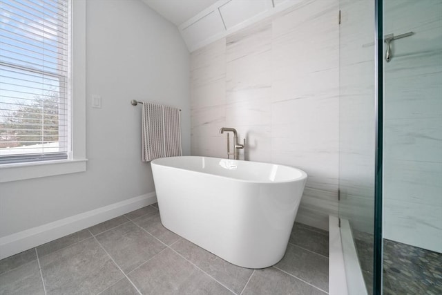 bathroom with shower with separate bathtub, radiator, tile walls, and tile patterned floors