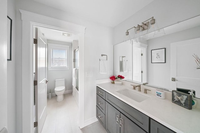 full bathroom featuring shower / bath combination with glass door, vanity, toilet, and tile patterned flooring