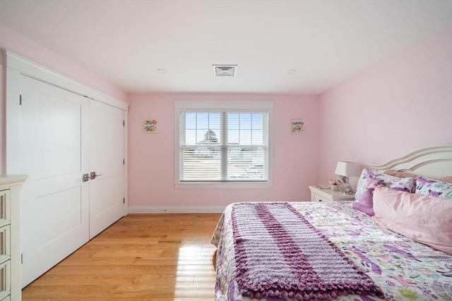 bedroom featuring light wood-type flooring