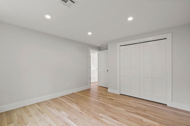 176 Palmer Ave Unit 2, Falmouth, MA 02540 - unfurnished bedroom featuring recessed lighting, light wood-type flooring, baseboards, and a closet