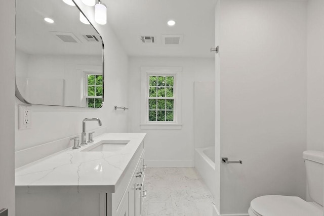 176 Palmer Ave Unit 2, Falmouth, MA 02540 - bathroom with baseboards, toilet, vanity, recessed lighting, and marble finish floors