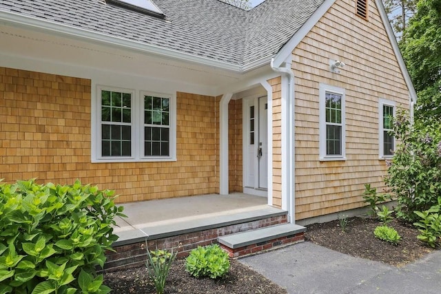 176 Palmer Ave Unit 2, Falmouth, MA 02540 - doorway to property with roof with shingles