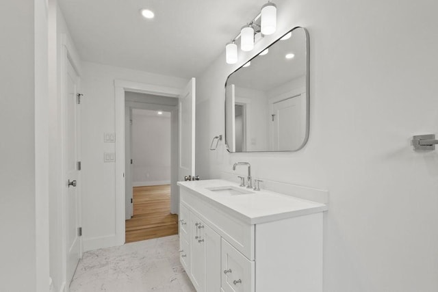176 Palmer Ave Unit 2, Falmouth, MA 02540 - bathroom featuring vanity, baseboards, recessed lighting, and marble look tile flooring