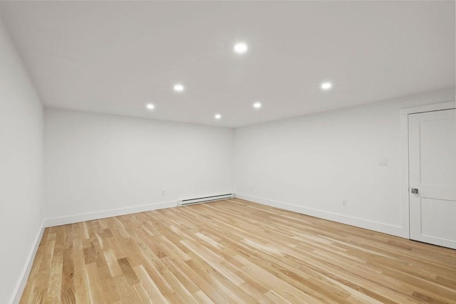 176 Palmer Ave Unit 2, Falmouth, MA 02540 - unfurnished room with baseboard heating, recessed lighting, light wood-style floors, and baseboards