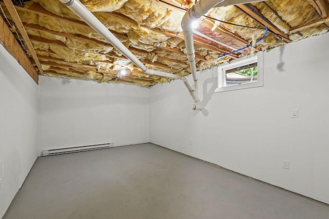 176 Palmer Ave Unit 2, Falmouth, MA 02540 - below grade area featuring a baseboard radiator