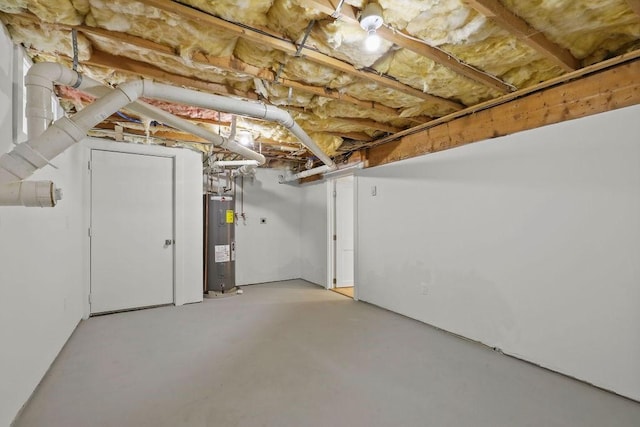 176 Palmer Ave Unit 2, Falmouth, MA 02540 - unfinished basement with water heater