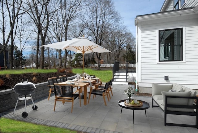 view of patio with an outdoor living space, outdoor dining area, and a grill