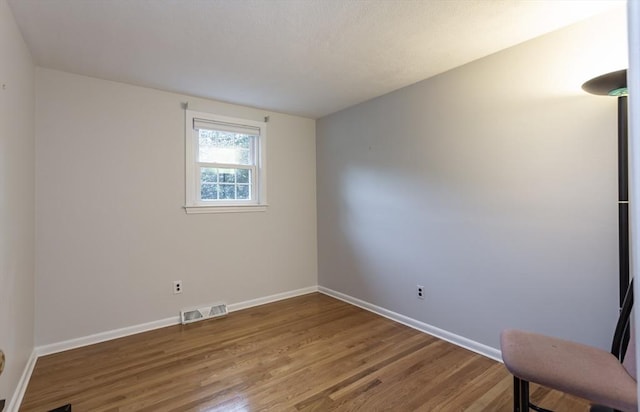 57 Mark Dr, Raynham, MA 02767 - unfurnished room with wood finished floors and baseboards