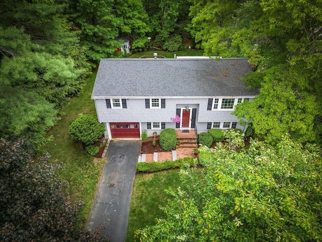 57 Mark Dr, Raynham, MA 02767 - raised ranch with driveway, a shingled roof, and an attached garage