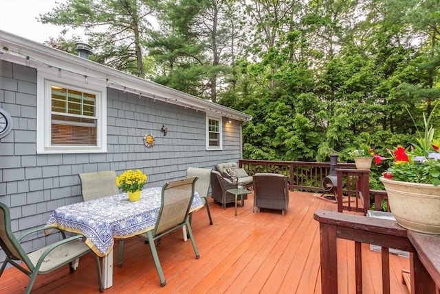 57 Mark Dr, Raynham, MA 02767 - wooden terrace with outdoor dining space