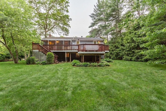57 Mark Dr, Raynham, MA 02767 - rear view of property featuring stairway, a deck, a yard, and a chimney
