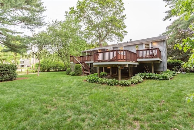 57 Mark Dr, Raynham, MA 02767 - view of green lawn with stairs and a wooden deck