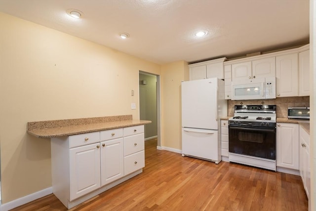 57 Mark Dr, Raynham, MA 02767 - kitchen with white appliances, baseboards, white cabinets, light wood-type flooring, and recessed lighting