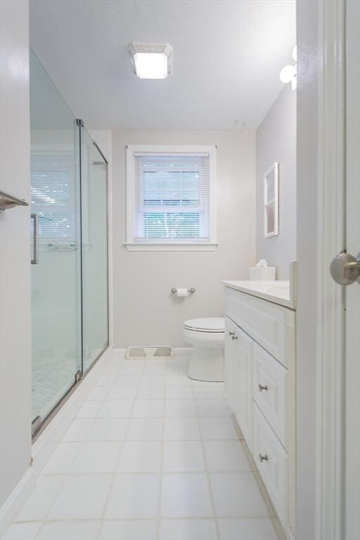 57 Mark Dr, Raynham, MA 02767 - bathroom with vanity, a stall shower, toilet, and baseboards