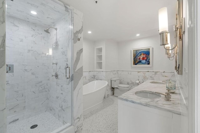 300 Boylston St Unit 907, Boston, MA 02116 - bathroom with a sink, tile walls, a marble finish shower, and a freestanding tub