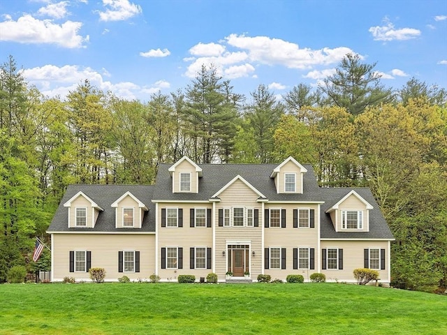 57 Houghton Farm Ln, Bolton, MA 01740 - view of front of home featuring a front lawn, view of wooded area, and roof with shingles