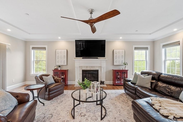 57 Houghton Farm Ln, Bolton, MA 01740 - living room featuring light wood-style floors, a raised ceiling, ceiling fan, a tile fireplace, and recessed lighting