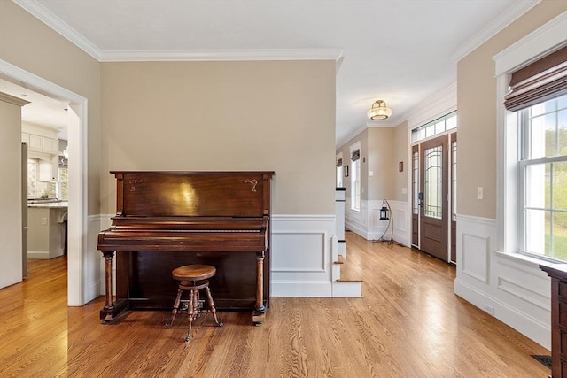 57 Houghton Farm Ln, Bolton, MA 01740 - sitting room featuring wood finished floors, plenty of natural light, crown molding, and wainscoting