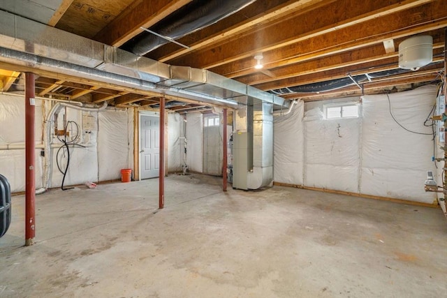 basement featuring heating unit