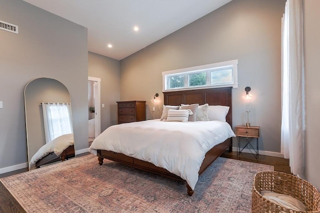 10 Wakefield Ave Unit A, Wakefield, MA 01880 - bedroom featuring multiple windows, baseboards, high vaulted ceiling, recessed lighting, and wood finished floors
