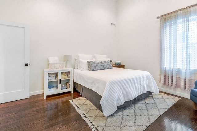 10 Wakefield Ave Unit A, Wakefield, MA 01880 - bedroom featuring wood finished floors and baseboards