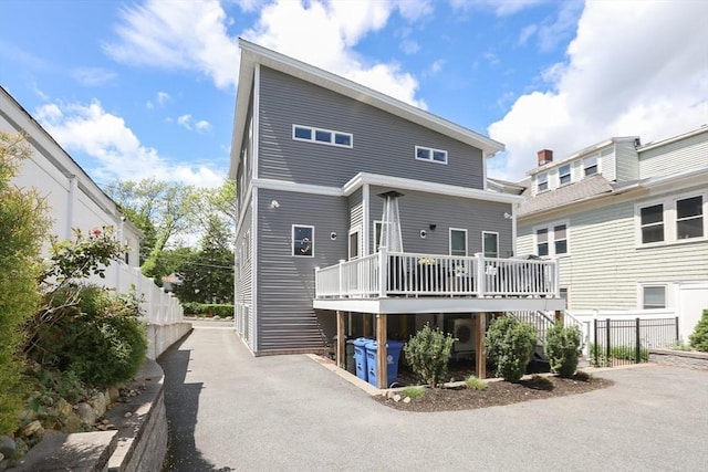 10 Wakefield Ave Unit A, Wakefield, MA 01880 - rear view of property featuring a wooden deck