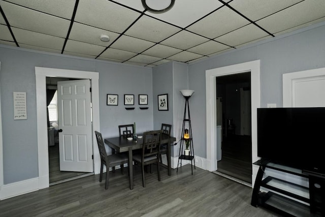 4 Columbia St, Holyoke, MA 01040 - dining space with baseboards, a drop ceiling, and wood finished floors