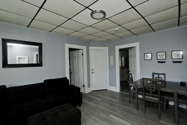 4 Columbia St, Holyoke, MA 01040 - living area with a paneled ceiling, baseboards, and wood finished floors