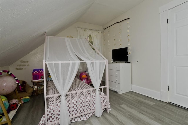 4 Columbia St, Holyoke, MA 01040 - bedroom with vaulted ceiling, wood finished floors, and baseboards