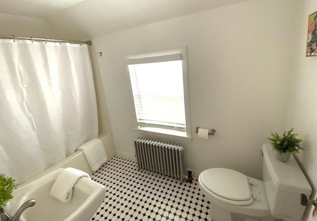 101 Adams St, Newton, MA 02458 - full bath with radiator heating unit and shower / bath combination with curtain