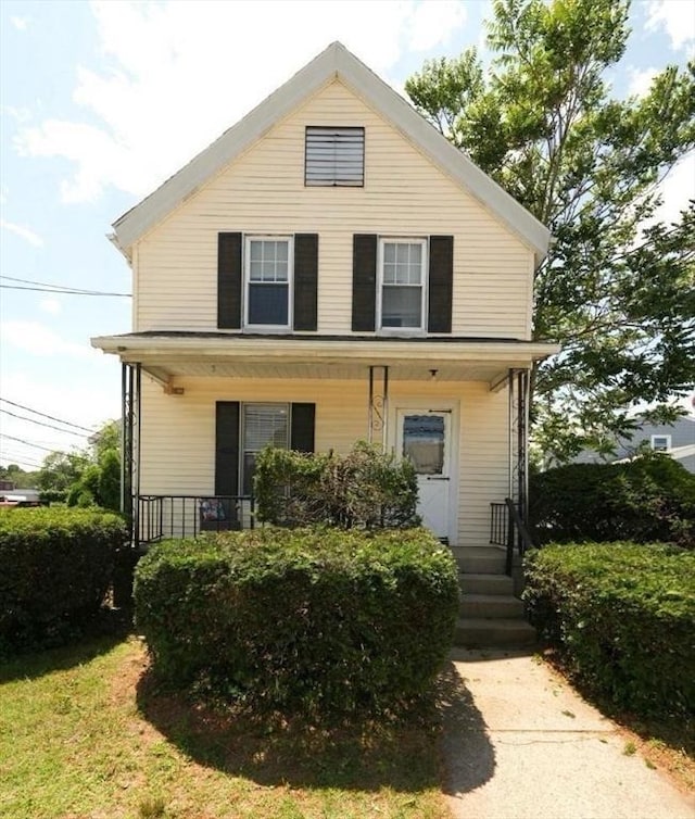 101 Adams St, Newton, MA 02458 - view of front of home featuring covered porch