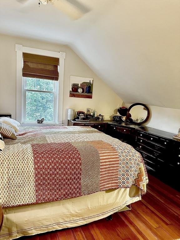 11 Moynan St, New Bedford, MA 02745 - bedroom with wood finished floors, vaulted ceiling, and a ceiling fan