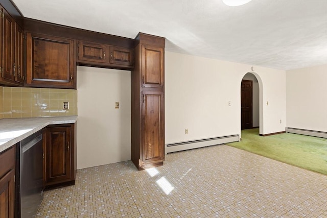 11 Ocean View Dr, Gloucester, MA 01930 - kitchen featuring a baseboard heating unit, stainless steel dishwasher, light countertops, arched walkways, and backsplash