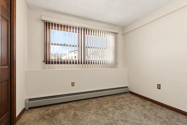 11 Ocean View Dr, Gloucester, MA 01930 - carpeted empty room with a baseboard radiator and baseboards