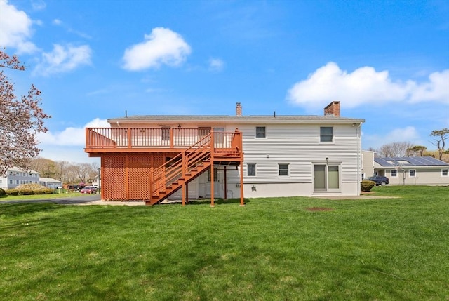 11 Ocean View Dr, Gloucester, MA 01930 - back of property featuring stairway, a wooden deck, a yard, and a chimney