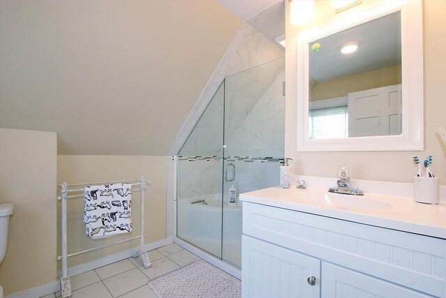 1243 Main St Unit 1243, Barnstable, MA 02635 - full bath with lofted ceiling, a shower stall, baseboards, toilet, and vanity