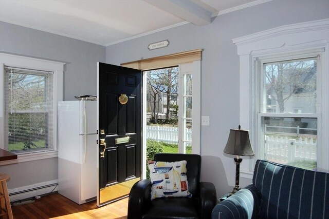 1243 Main St Unit 1243, Barnstable, MA 02635 - doorway with crown molding, baseboard heating, a wealth of natural light, and wood finished floors