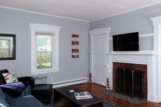 1243 Main St Unit 1243, Barnstable, MA 02635 - living room with crown molding, baseboard heating, wood finished floors, and a fireplace